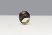 Todd Reed Ring with fancy cut diamond (6.56ct) and black diamonds (3.47ct) in 18k yellow gold and aluminum.
